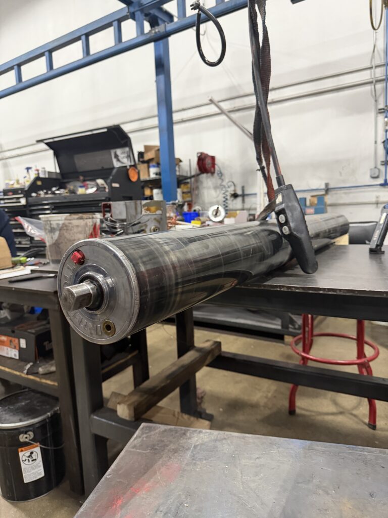 Van der Graaf drum motor (motorized pulley) on the bench at A Plus for repair